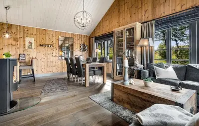 a living room with a couch and a table at 4 Bedroom Gorgeous Home In Rauland in Rauland