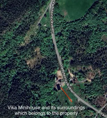 a map of a mountain with a road at Vika Minihouse in Kristiansund