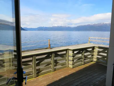 a view of the water from a dock on a boat at Fjordhytte-16 direkt am Sognefjord in Bjordal, mit mietbaren 9,9 PS bis 60 PS Motorbooten in Bjordal