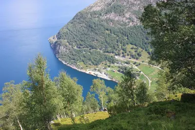 a view of a mountain with a road on it at Fjordhytte-23 direkt am Sognefjord, mit mietbaren Motorbooten 9,9-60 PS in Bjordal