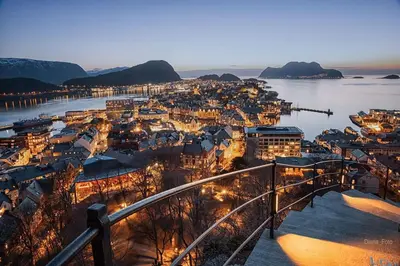 an aerial view of a city with a harbor at Fjord-view apartment in Ålesund