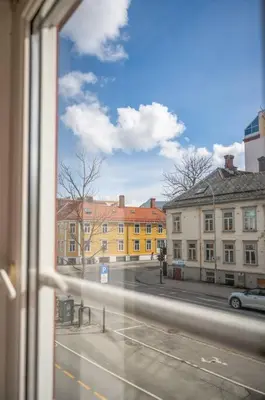 a view of a city street from a window at Studio in the city centre in Trondheim