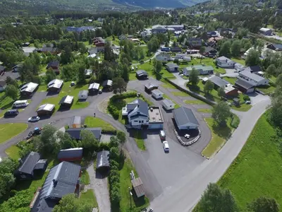 an aerial view of a small town with houses at Geilo Hytter & Camping in Geilo