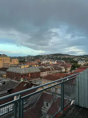 a view of a city with buildings and roofs at Penthouse in Trondheim City Centre in Trondheim