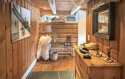 a dog standing in a kitchen with a sink at 4 Bedroom Cozy Home In Gol in Golsfjellet