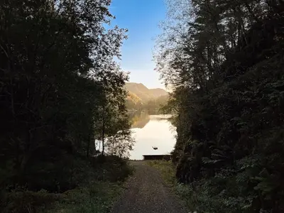 a dirt road next to a body of water at Holiday Home Soltun by Interhome in Flygansvær