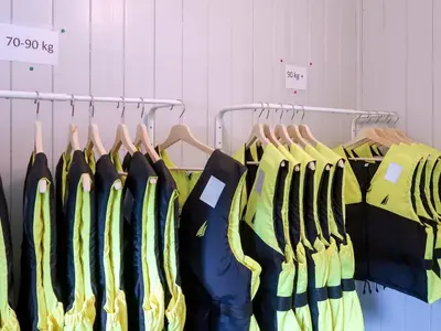 a group of shirts hanging on a rack at Holiday Home Nesjevik by Interhome in Bø