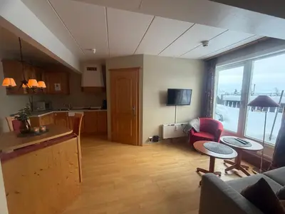 a room with a kitchen and a living room at Family-Friendly Apartment Close To Nature in Beitostøl