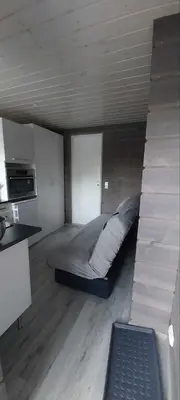 a small bedroom with a bed in a room at Hos Jurate in Fagernes