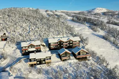 an aerial view of a home covered in snow at Panorama 4 C Ski Inn And Out With Views Of Slettefjell in Beitostøl