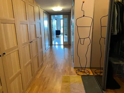 a hallway with a drawing of a mannequin on the wall at Fjordgata i Trondheim in Trondheim