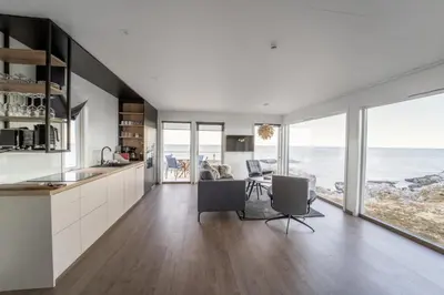 an open kitchen with a view of the ocean at Runde Panorama - Highlight View in Runde