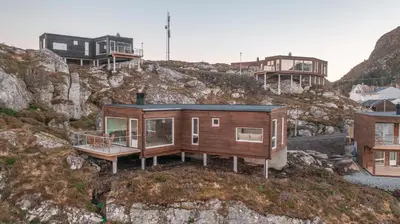 a house on a hill with houses on it at Runde Panorama - Eden in Runde