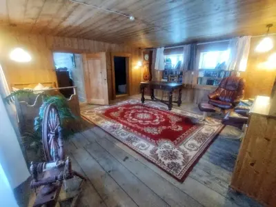 an aerial view of a living room with a piano at Langlete gjestehus in Gilset
