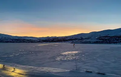 a view of a frozen lake with mountains in the background at Stunning Apartment In Tyinkrysset in Tyinkrysset