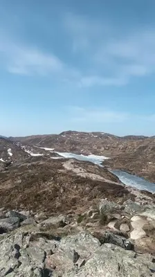 a view of a mountain with snow and a river at Sentralt, kort vei til byens fasiliteter in Molde