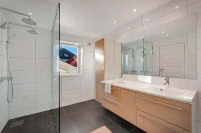 a bathroom with a sink and a shower at The Townhouse Dream I Must See Views! in Bergen