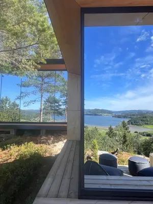 a house with a view of the water at Speilsuite med egen badstue og panorama in Steinkjer