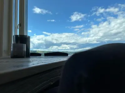 a view of the ocean from a window of a room at MJOS TOWER - Balcony Suite with lake view in Ringsaker