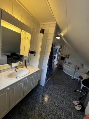 a bathroom with a sink and a tub at Villa with a view in Morviki