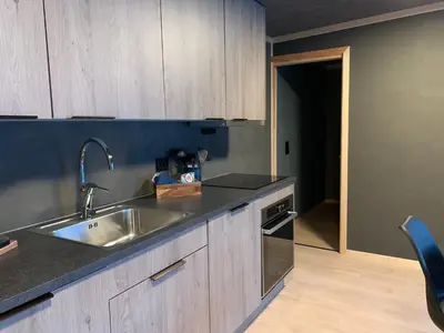 a kitchen with a sink and a counter top at Stryn Golden Resort - Panorama I in Stryn
