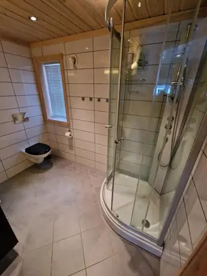 a bathroom with a shower and a toilet at Hytte Gaustablikk in Gaustablikk