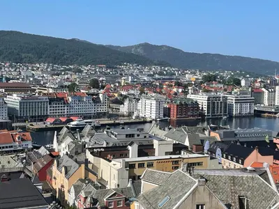 a view of a city with a river and buildings at Flott leilighet in Bergen