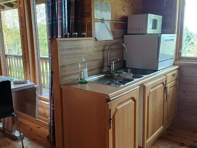 a kitchen with a sink and a microwave at 7 person holiday home in Skjold-By Traum in Skjold