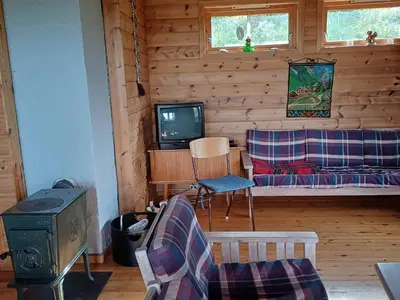 a living room with a tv and a couch at 7 person holiday home in Skjold-By Traum in Skjold