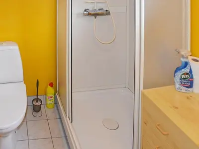 a shower stall in a bathroom with a toilet at 2 person holiday home in Måndalen-By Traum in Sæbø