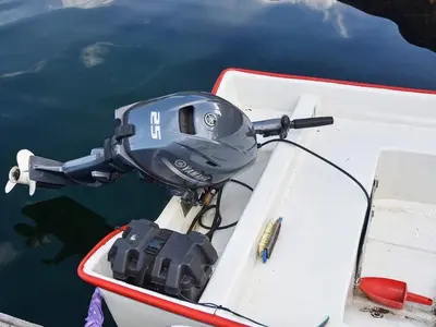 a motor on the back of a boat in the water at 2 person holiday home in Måndalen-By Traum in Sæbø