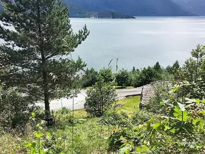 a view of a body of water with a tree at 8 person holiday home in Norheimsund-By Traum in Norheimsund