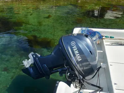 a motor on the side of a boat in the water at 7 person holiday home in Selje-By Traum in Selje