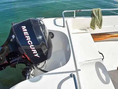 a cooler on the side of a boat in the water at 6 person holiday home in Farstad-By Traum in Farstad