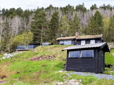 a house sitting on top of a hill at 4 person holiday home in Øydegard-By Traum in Torvikbukt