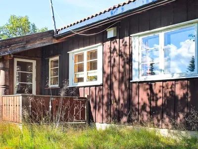 a house with two windows on the side of it at 6 person holiday home in NESBYEN-By Traum in Nesbyen