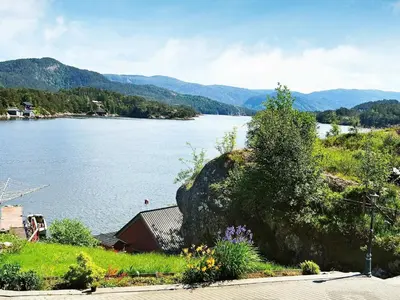 a view of a large body of water with mountains at 10 person holiday home in HOSTELAND-By Traum in Hosteland