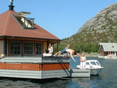 a group of people on a boat in the water at 6 person holiday home in Kalvåg-By Traum in Kalvåg