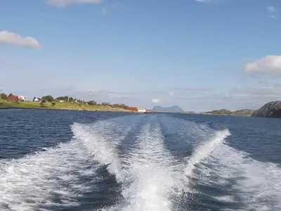 a boat is leaving a wake in the water at 6 person holiday home in Sørbøvåg-By Traum in Sørbø