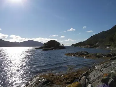 a large body of water with mountains in the background at 6 person holiday home in Sørbøvåg-By Traum in Sørbø