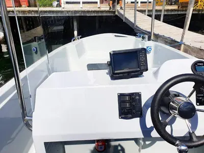 a boat with a monitor on the front of it at 6 person holiday home in Gursken-By Traum in Larsnes