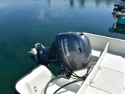 a motor on the back of a boat in the water at 8 person holiday home in VEVANG-By Traum in Vevang