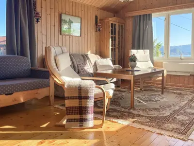 a living room with a couch and a table at 3 person holiday home in Frei-By Traum in Frei
