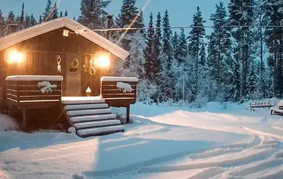 a small cabin with snow on the steps at Cozy Home In Vinje With Wifi in Hommo