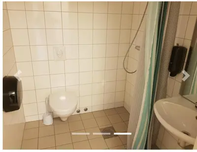a bathroom with a toilet and a sink at Hybelleilighet 4 pers ski-VM 2025 in Trondheim