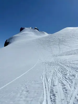 a snow covered mountain with tracks in the snow at Ny koselig hytte ved Sogn skisenter in Hafslo