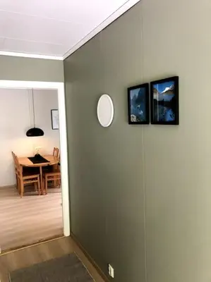 a hallway with a dining room with a table at Flat in the center of Loen in Loen