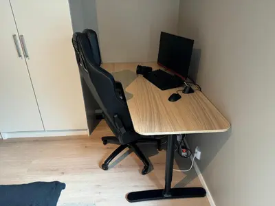a desk with a chair and a computer on it at Luxury Apartment in Bergen, 10min from City Centre in Bergen