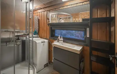 a small bathroom with a sink and a shower at 3 Bedroom Amazing Home In Tysse in Tysse