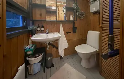 a bathroom with a sink and a toilet at 3 Bedroom Amazing Home In Tysse in Tysse